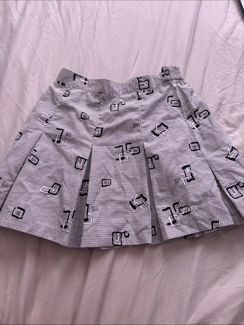 Prince Black & White Pleated Mini Skirt with Geometric Motif